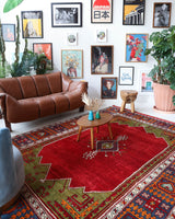 Vintage Turkish rug in a living room setting, pile rug, Turkish rug, vintage rug, portland, rug shop, bright colors, wild shaman, soft rug, bold color, Portland, Oregon, rug store, rug shop, local shop, antique rug