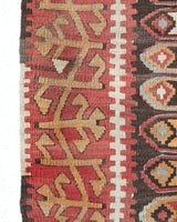 Vintage kilim rug in living room setting, old rug, antique rug, pastel colors, faded colors, Turkish rug, vintage rug, soft rug, Portland, Oregon, rug store, rug shop, local shop, earthy tones, earthy colors, warm colors