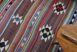 Vintage kilim rug in room decor setting, old rug, antique rug, pastel colors, faded colors, Turkish rug, vintage rug, soft rug, Portland, Oregon, rug store, rug shop, local shop, bold colors, bright colors, faded colors