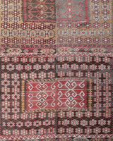 Vintage kilim rug in living room setting, old rug, antique rug, pastel colors, faded colors, Turkish rug, vintage rug, soft rug, Portland, Oregon, rug store, rug shop, local shop, earthy tones, earthy colors, warm colors