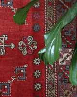 Vintage Turkish rug in living room setting, old rug, antique rug, pastel colors, faded colors, Turkish rug, vintage rug, soft rug, Portland, Oregon, rug store, rug shop, local shop