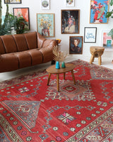 Vintage Turkish rug in living room setting, old rug, antique rug, pastel colors, faded colors, Turkish rug, vintage rug, soft rug, Portland, Oregon, rug store, rug shop, local shop