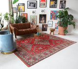 Vintage Turkish rug in living room setting, old rug, antique rug, pastel colors, faded colors, Turkish rug, vintage rug, soft rug, Portland, Oregon, rug store, rug shop, local shop