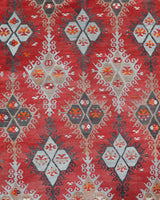 Vintage kilim rug in living room setting, old rug, antique rug, pastel colors, faded colors, Turkish rug, vintage rug, soft rug, Portland, Oregon, rug store, rug shop, local shop, earthy tones, earthy colors, warm colors