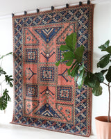 Vintage Turkish rug in living room setting, old rug, antique rug, pastel colors, faded colors, Turkish rug, vintage rug, soft rug, Portland, Oregon, rug store, rug shop, local shop