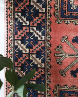 Vintage Turkish rug in living room setting, old rug, antique rug, pastel colors, faded colors, Turkish rug, vintage rug, soft rug, Portland, Oregon, rug store, rug shop, local shop