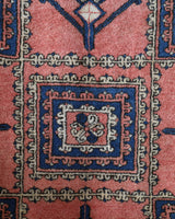 Vintage Turkish rug in living room setting, old rug, antique rug, pastel colors, faded colors, Turkish rug, vintage rug, soft rug, Portland, Oregon, rug store, rug shop, local shop