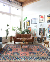 Vintage Turkish rug in living room setting, old rug, antique rug, pastel colors, faded colors, Turkish rug, vintage rug, soft rug, Portland, Oregon, rug store, rug shop, local shop