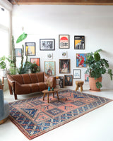 Vintage Turkish rug in living room setting, old rug, antique rug, pastel colors, faded colors, Turkish rug, vintage rug, soft rug, Portland, Oregon, rug store, rug shop, local shop