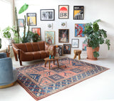 Vintage Turkish rug in living room setting, old rug, antique rug, pastel colors, faded colors, Turkish rug, vintage rug, soft rug, Portland, Oregon, rug store, rug shop, local shop