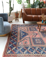 Vintage Turkish rug in living room setting, old rug, antique rug, pastel colors, faded colors, Turkish rug, vintage rug, soft rug, Portland, Oregon, rug store, rug shop, local shop