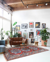 Vintage Turkish rug in living room setting, old rug, antique rug, pastel colors, faded colors, Turkish rug, vintage rug, soft rug, Portland, Oregon, rug store, rug shop, local shop