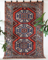 Vintage Turkish rug in living room setting, old rug, antique rug, pastel colors, faded colors, Turkish rug, vintage rug, soft rug, Portland, Oregon, rug store, rug shop, local shop