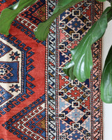 Vintage Turkish rug in living room setting, old rug, antique rug, pastel colors, faded colors, Turkish rug, vintage rug, soft rug, Portland, Oregon, rug store, rug shop, local shop