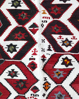 Vintage kilim rug in room decor setting, old rug, antique rug, pastel colors, faded colors, Turkish rug, vintage rug, soft rug, Portland, Oregon, rug store, rug shop, local shop, antique kilim rug, bold colors, bright colors