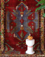 Vintage Turkish rug in a living room setting, pile rug, Turkish rug, vintage rug, portland, rug shop, bright colors, wild shaman, soft rug, bold color, Portland, Oregon, rug store, rug shop, local shop, antique rug