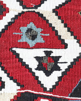 Vintage kilim rug in room decor setting, old rug, antique rug, pastel colors, faded colors, Turkish rug, vintage rug, soft rug, Portland, Oregon, rug store, rug shop, local shop, antique kilim rug, bold colors, bright colors