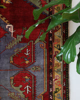 Vintage Turkish rug in a living room setting, pile rug, Turkish rug, vintage rug, portland, rug shop, bright colors, wild shaman, soft rug, bold color, Portland, Oregon, rug store, rug shop, local shop, antique rug