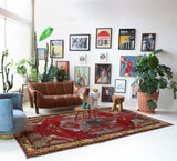 Vintage Turkish rug in a living room setting, pile rug, Turkish rug, vintage rug, portland, rug shop, bright colors, wild shaman, soft rug, bold color, Portland, Oregon, rug store, rug shop, local shop, antique rug