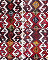 Vintage kilim rug in room decor setting, old rug, antique rug, pastel colors, faded colors, Turkish rug, vintage rug, soft rug, Portland, Oregon, rug store, rug shop, local shop, antique kilim rug, bold colors, bright colors