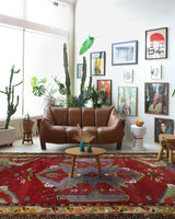 Vintage Turkish rug in a living room setting, pile rug, Turkish rug, vintage rug, portland, rug shop, bright colors, wild shaman, soft rug, bold color, Portland, Oregon, rug store, rug shop, local shop, antique rug