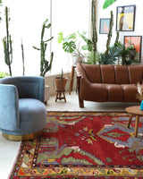 Vintage Turkish rug in a living room setting, pile rug, Turkish rug, vintage rug, portland, rug shop, bright colors, wild shaman, soft rug, bold color, Portland, Oregon, rug store, rug shop, local shop, antique rug