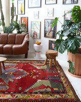 Vintage Turkish rug in a living room setting, pile rug, Turkish rug, vintage rug, portland, rug shop, bright colors, wild shaman, soft rug, bold color, Portland, Oregon, rug store, rug shop, local shop, antique rug