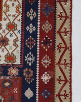 Vintage kilim rug in living room setting, old rug, antique rug, pastel colors, faded colors, Turkish rug, vintage rug, soft rug, Portland, Oregon, rug store, rug shop, local shop, earthy tones, earthy colors, warm colors