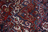 Antique Persian area rug in a living room setting, pile rug, vintage rug, portland, rug shop, bright colors, wild shaman, soft rug, bold color, Portland, Oregon, rug store, rug shop, local shop, antique rug, Persian rug, handmade rug, wool rug