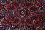 Antique Persian area rug in a living room setting, pile rug, vintage rug, portland, rug shop, bright colors, wild shaman, soft rug, bold color, Portland, Oregon, rug store, rug shop, local shop, antique rug, Persian rug, handmade rug, wool rug