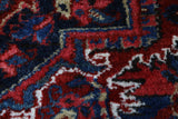 Antique Persian area rug in a living room setting, pile rug, vintage rug, portland, rug shop, bright colors, wild shaman, soft rug, bold color, Portland, Oregon, rug store, rug shop, local shop, antique rug, Persian rug, handmade rug, wool rug