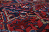 Antique Persian area rug in a living room setting, pile rug, vintage rug, portland, rug shop, bright colors, wild shaman, soft rug, bold color, Portland, Oregon, rug store, rug shop, local shop, antique rug, Persian rug, handmade rug, wool rug