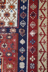 Vintage kilim rug in living room setting, old rug, antique rug, pastel colors, faded colors, Turkish rug, vintage rug, soft rug, Portland, Oregon, rug store, rug shop, local shop, earthy tones, earthy colors, warm colors