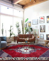 Vintage Turkish rug in a living room setting, pile rug, Turkish rug, vintage rug, portland, rug shop, bright colors, wild shaman, soft rug, bold color, Portland, Oregon, rug store, rug shop, local shop, antique rug