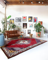 Vintage Turkish rug in a living room setting, pile rug, Turkish rug, vintage rug, portland, rug shop, bright colors, wild shaman, soft rug, bold color, Portland, Oregon, rug store, rug shop, local shop, antique rug