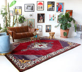 Vintage Turkish rug in a living room setting, pile rug, Turkish rug, vintage rug, portland, rug shop, bright colors, wild shaman, soft rug, bold color, Portland, Oregon, rug store, rug shop, local shop, antique rug