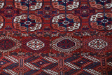 Antique Turkmen rug in a living room setting, pile rug, Turkish rug, vintage rug, portland, rug shop, bright colors, wild shaman, soft rug, bold color, Portland, Oregon, rug store, rug shop, local shop, antique rug