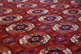 Antique Turkmen rug in a living room setting, pile rug, Turkish rug, vintage rug, portland, rug shop, bright colors, wild shaman, soft rug, bold color, Portland, Oregon, rug store, rug shop, local shop, antique rug
