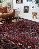 Antique Persian area rug in a living room setting, pile rug, vintage rug, portland, rug shop, bright colors, wild shaman, soft rug, bold color, Portland, Oregon, rug store, rug shop, local shop, antique rug, Persian rug, handmade rug, wool rug, distressed rug