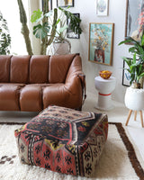 Floor pouf in a living room setting, pillow, turkish pillow, kilim pillow, home decor, decorative pillow, sham, rug pillow, decor, home decor, pouf, floor cushion, cushion, Portland, rugshop, Oregon, Wild Shaman, ottoman