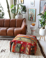 Floor pouf in a living room setting, pillow, turkish pillow, kilim pillow, home decor, decorative pillow, sham, rug pillow, decor, home decor, pouf, floor cushion, cushion, Portland, rugshop, Oregon, Wild Shaman, ottoman