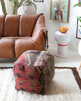 Floor pouf in a living room setting, pillow, turkish pillow, kilim pillow, home decor, decorative pillow, sham, rug pillow, decor, home decor, pouf, floor cushion, cushion, Portland, rugshop, Oregon, Wild Shaman, ottoman