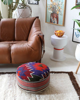 Floor pouf in a living room setting, pillow, turkish pillow, kilim pillow, home decor, decorative pillow, sham, rug pillow, decor, home decor, pouf, floor cushion, cushion, Portland, rugshop, Oregon, Wild Shaman, ottoman