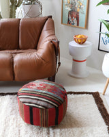 Floor pouf in a living room setting, pillow, turkish pillow, kilim pillow, home decor, decorative pillow, sham, rug pillow, decor, home decor, pouf, floor cushion, cushion, Portland, rugshop, Oregon, Wild Shaman, ottoman