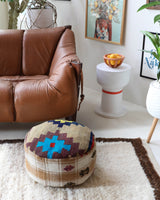 Floor pouf in a living room setting, pillow, turkish pillow, kilim pillow, home decor, decorative pillow, sham, rug pillow, decor, home decor, pouf, floor cushion, cushion, Portland, rugshop, Oregon, Wild Shaman, ottoman