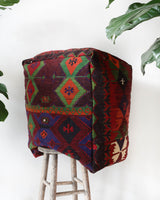 Floor pouf in a living room setting, pillow, turkish pillow, kilim pillow, home decor, decorative pillow, sham, rug pillow, decor, home decor, pouf, floor cushion, cushion, Portland, rugshop, Oregon, Wild Shaman, ottoman