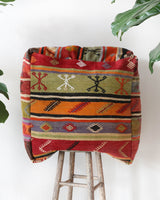 Floor pouf in a living room setting, pillow, turkish pillow, kilim pillow, home decor, decorative pillow, sham, rug pillow, decor, home decor, pouf, floor cushion, cushion, Portland, rugshop, Oregon, Wild Shaman, ottoman