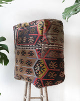 Floor pouf in a living room setting, pillow, turkish pillow, kilim pillow, home decor, decorative pillow, sham, rug pillow, decor, home decor, pouf, floor cushion, cushion, Portland, rugshop, Oregon, Wild Shaman, ottoman