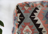 Floor pouf in a living room setting, pillow, turkish pillow, kilim pillow, home decor, decorative pillow, sham, rug pillow, decor, home decor, pouf, floor cushion, cushion, Portland, rugshop, Oregon, Wild Shaman, ottoman