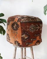 Floor pouf in a living room setting, pillow, turkish pillow, kilim pillow, home decor, decorative pillow, sham, rug pillow, decor, home decor, pouf, floor cushion, cushion, Portland, rugshop, Oregon, Wild Shaman, ottoman